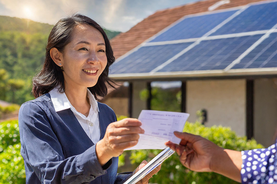 woman receiving check